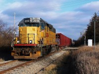 GEXR 582 heads back to Cambridge on the Fergus Spur with a short train. 