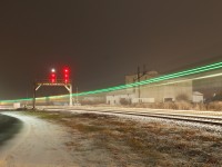 VIA 81 negotiates the curve through Paris, Ontario during an evening snowfall. 