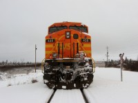 NORTHERN EXPOSURE. After leaving the warmth of the cab of AC4400CW #420 during the first major snow storm of the season on November 18, 2010, the photographer turns to capture one last image of the GE unit. Joseph Hynes, a long time engineer with the QNS&L, was waiting on the mainline just outside Labrador City for clearance to bring the 420 and sister General Electric engine 422 back into the yard of the Iron Ore Company of Canada for a later run of ore to Sept-Iles. It was the beginning of a wonderful friendship of two men, one a railroader and the other a railfan, who both shared a passion for trains.