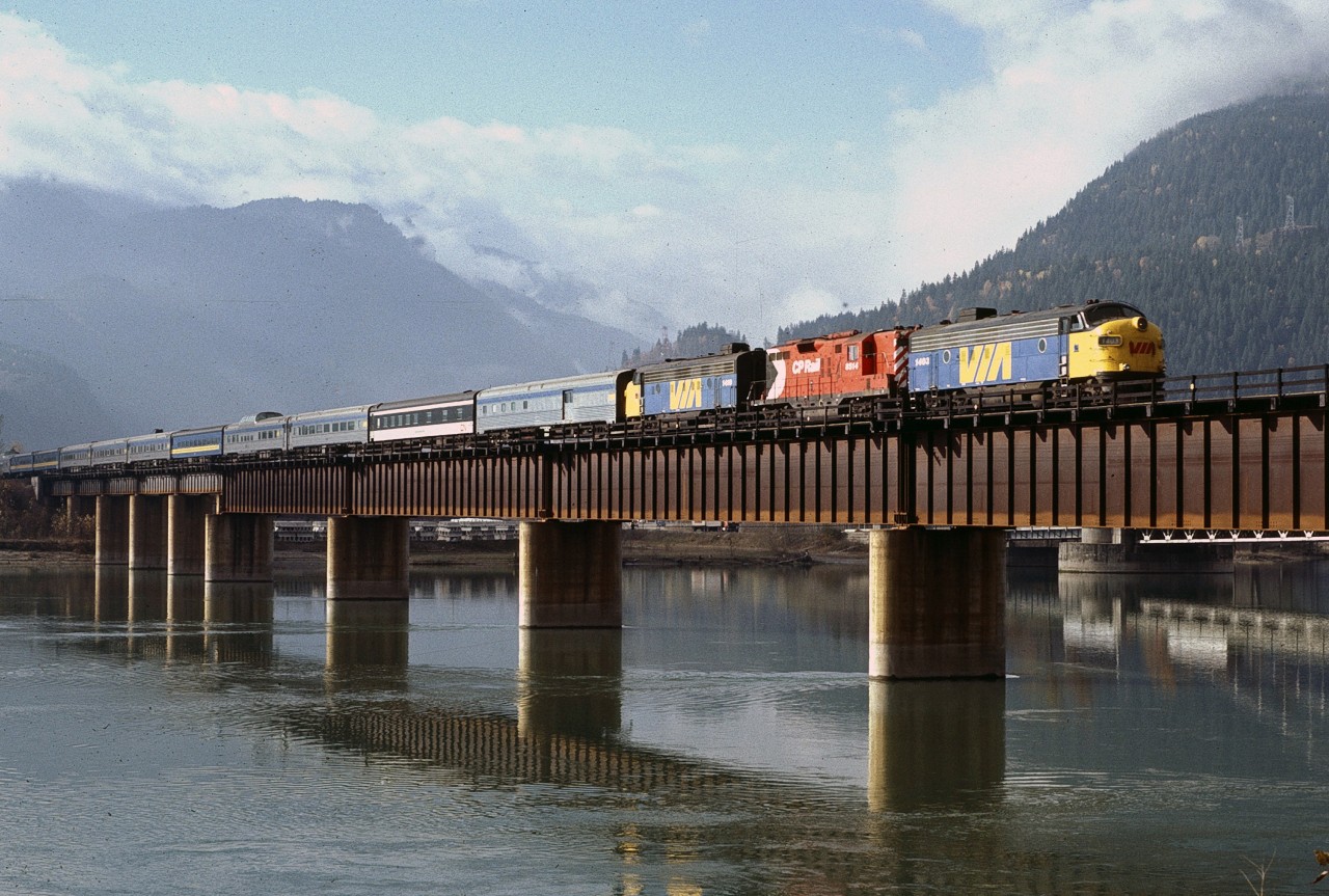 VIA 2, the eastbound Canadian is crossing the Columbia River bridge at Revelstoke BC with a colourful array of equipment.  Apart from the Geep, it could easily pass for a Rapido Model Trains version of the Canadian.