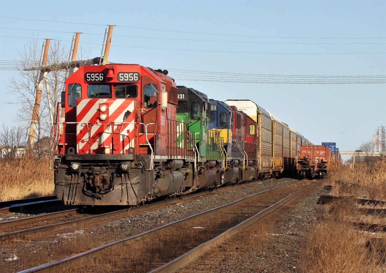 With train 142 clear, CP 5956, NREX 7931, ICE 6413 and SOO 6047 are ready to proceed west to Chicago with train 241. 142 was lead by CP 6021 along with a GE, meanwhile train 240 was waiting at Dougall Ave. a few miles west of here lead by two SD40-2's.