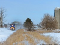 <b>Anticipation: </b>OSR St. Thomas job's two FP9A's respond to the crew's heavy throttle application with snow drifts ahead.. a glorious, melodic sound is heard as their 567's groan in response, and our hearts (Crew and photographer) beat faster knowing that something exciting is about to happen.<br><br> I won't post the next image immediately folks, but please comment below what you think comes next :)