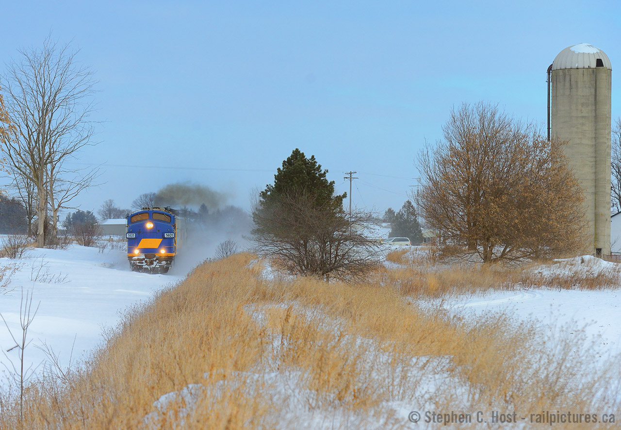 Anticipation: OSR's two FP9A's respond to the crew's heavy throttle application with snow drifts ahead.. a glorious, melodic sound is heard as their 567's groan in response, and our hearts (Crew and photographer) are all beating faster knowing that something exciting is about to happen. I won't post the next image immediately folks, but please comment below what you think comes next :)