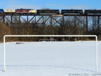 <b>Anyone for snow soccer?</b> It's hard to beat this! The "Wabash Tresle" (as Locals call it) has has long been the subject of my affection, after all this bridge is used for THREE masthead photos on this site. I've visited in 2004, 2005, 2006, 2014, and now 2017 and was rewarded with good things each time. In this case, the repainted 6508 is new to my photography of this bridge - and the fact the Wabash used their 22 or so F7A's multiple times daily here (into the N&W era) until the late 70's makes this very appropriate subject matter. The OSR St. Thomas turn now calls to St. Thomas 5 days a week, along with CN 584 out of London, which also operates about 5 or more days a week meaning you have multiple switching movements per day, in daylight, over this structure. Go when it's sunny please, it's a shame not to :) And the bridge is indeed open from end to end, I didn't check how far but soon we might have trains going to Talbotville yard (a mile or so west) and  possibly even Paynes Mills where the CNR Payne sub  ends. Locals comment below what you've seen please. I'll be back, but give me another year.