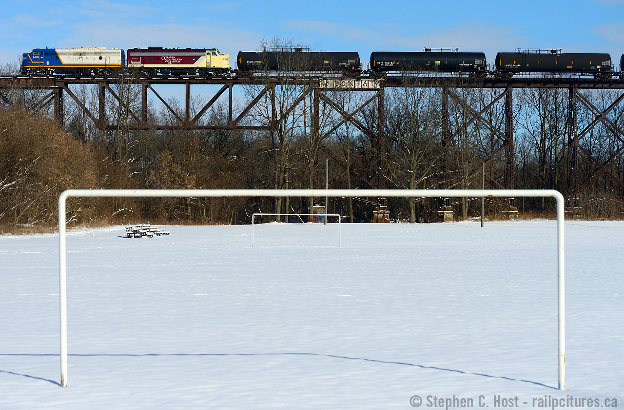 Anyone for soccer? It's hard to beat this! The "Wabash Tresle" (as Locals call it) has has long been the subject of my affection, after all this bridge is used for THREE masthead photos on this site. I've visited in 2004, 2005, 2006, 2014, and now 2017 and was rewarded with good things each time. In this case, the repainted 6508 is new to my photography of this bridge - and the fact the Wabash used their 22 or so F7A's multiple times daily here until the early 1980's makes this very appropriate subject matter. The OSR St. Thomas turn now calls to St. Thomas 5 days a week, along with CN 584 out of London, which also operates about 5 or more days a week meaning you have multiple switching movements per day, in daylight, over this structure. Go when it's sunny please, it's a shame not to :) And the bridge is indeed open from end to end, I didn't check how far but soon we might have trains going to Talbotville yard (a mile or so west) and  possibly even Paynes Mills where the CNR Payne sub  ends. Locals comment below what you've seen please. I'll be back, but give me another year.