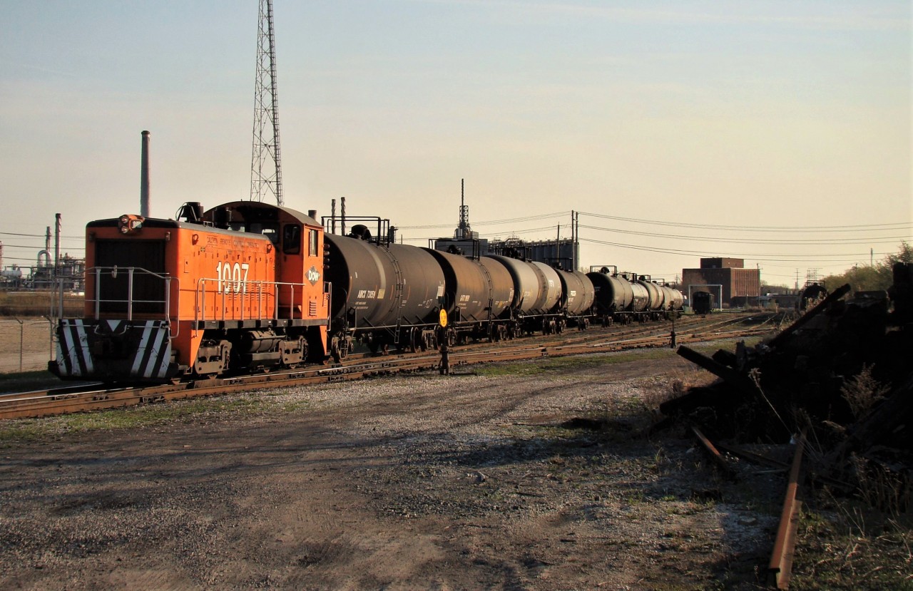 The former Dow Chemical switcher is seen here switching cars in the small yard along Vidal St. now working for VIP (Vidal Industrial Park) after Dow shut down their Sarnia operations - a once busy customer on the C&O/ CSX Sarnia Sub. The unit seemed to disappear soon after this shot.