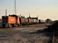 The former Dow Chemical switcher is seen here switching cars in the small yard along Vidal St. now working for VIP (Vidal Industrial Park) after Dow shut down their Sarnia operations - a once busy customer on the C&O/ CSX Sarnia Sub. The unit seemed to disappear soon after this shot.