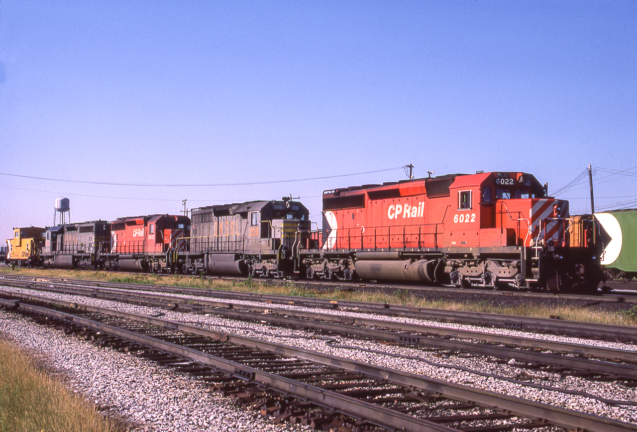 CP 6022 and a mix of CP and QNS&L power are in Toronto on August 8, 1985.