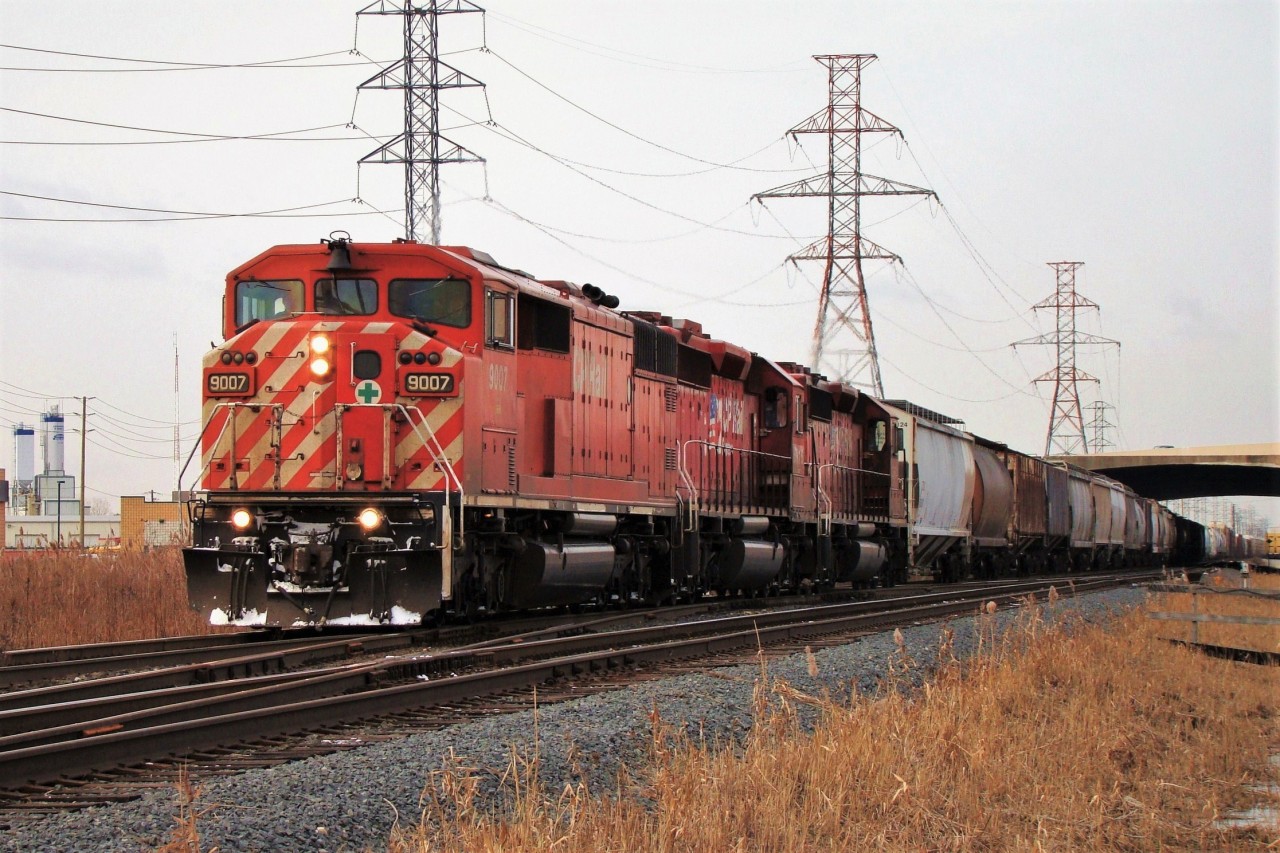 CP SD40-2F 9007 leads two other SD40-2's ahead of a long mixed freight out of Windsor bound for Toronto.