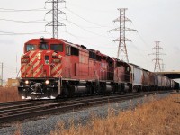 CP SD40-2F 9007 leads two other SD40-2's ahead of a long mixed freight out of Windsor bound for Toronto.