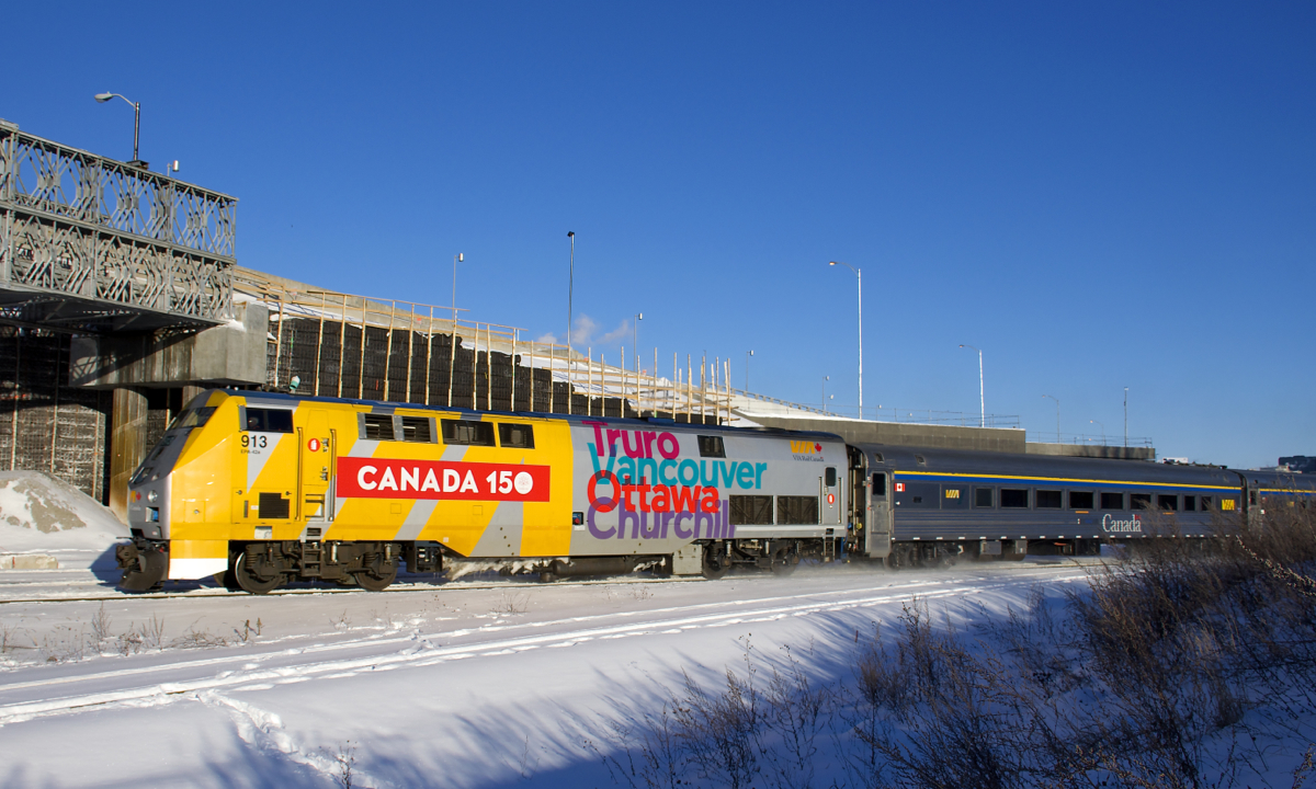 With Canada's 150th anniversary year now at an end, VIA Rail is starting to remove 'Canada 150' markings from rolling stock. It has not been removed yet from P42DC VIA 913, which is seen leading VIA 63 past the Turcot Holding Spur in Montreal.