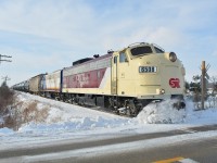 The St. Thomas Job makes a rare run out to Alymer to store a cut of cars. It's pictured at Yarmouth Center Road busting some snow build up