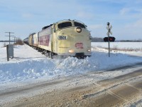 The St. Thomas Job clears the track block at Belmont Rd. from the week's snow build up at a speedy less than 10mph