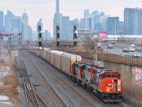 CN L570 is seen making a rare move through the Union Station Rail Corridor (USRC) pulling through the plant at Dufferin (Exhibition GO). Behind 4776, 4771, and 4114 are 88 empty racks bound for Oakville from Mac yard. Thanks for the heads up!