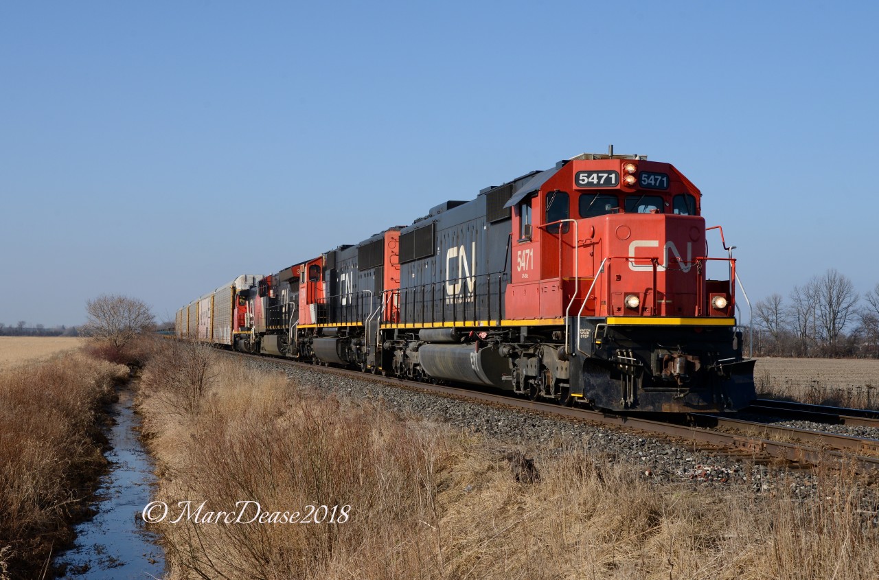 CN 5471 leads the daily 509 back to London. ON., from Sarnia with CN 5704, CN 3112 and CN 4788 which I believe was picked up in Sarnia.