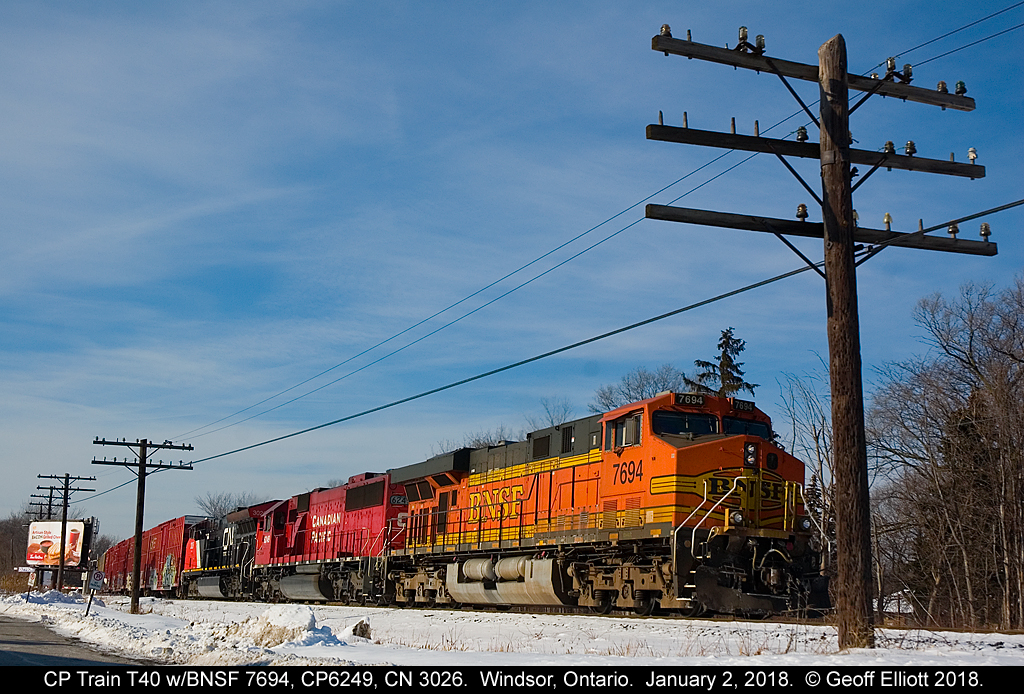 Strange bed fellows........  CP Transfer T40 backs into Windsor Yard on January 2, 2018 with quite a variety of power to show off with BNSF ES44DC #7694 on point, CP SD60 #6249, and new CN ET44CW #3026 rounding out the trio.  I think it's time to start the merger rumours!!  :-)