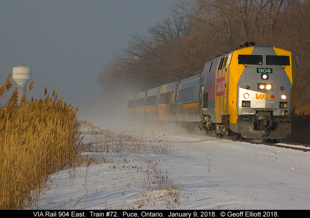 With the Lakeshore water tower looking on, VIA 904 heads up Train #72 as it speeds through Puce, Ontario.