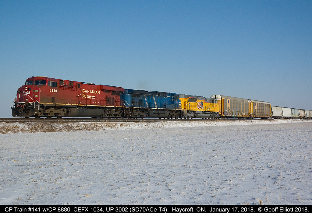 A colorful CP Train #141 rolls along just west of Haycroft, Ontario on January 17, 2018.  Consist today is CP 8880, CEFX 1034, and Union Pacific 3002, an SD70Ace-T4 and former EMDX Demonstrator 1504.  Nice to get these colorful consists during the nice crisp, clear winter days.