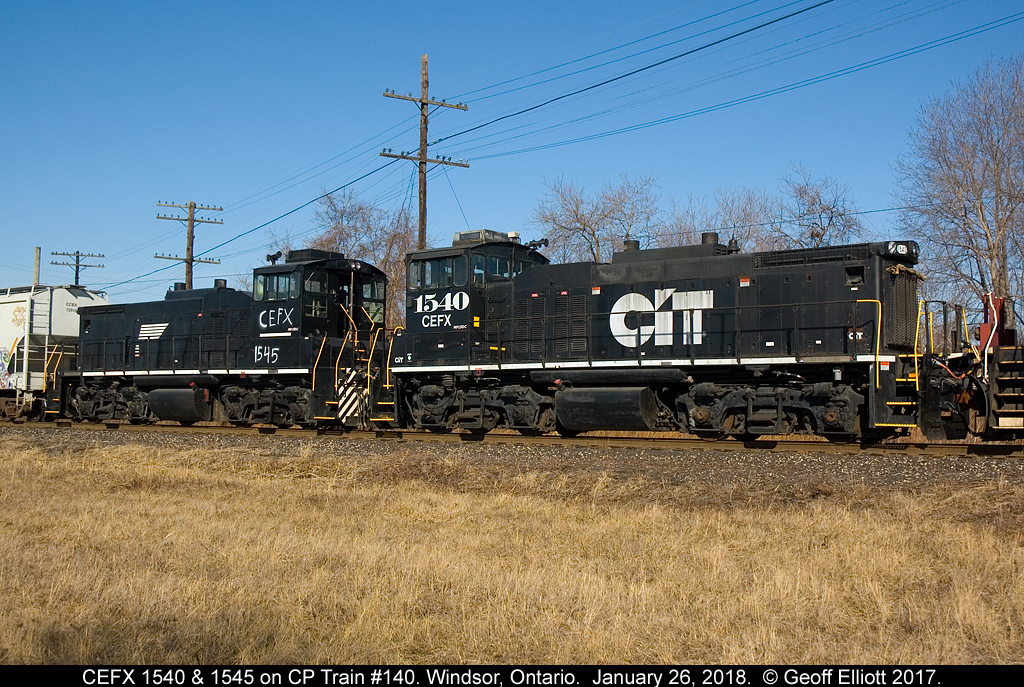 Trailing dead on CP Train #140 today were 2 ex-NS MP15DC's. Here is the pair, CEFX 1540 and 1545, as train 140 shoves back into Windsor Yard.  Personally I love the spray painted lettering on the side of 1545.  :-)
