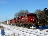 On a cold New Years Day, 234 hustles past Orrs Lake Siding. 