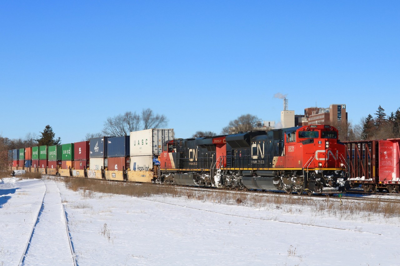 CN 8831 leads Q148 through Brantford.