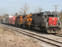 Goderich-Exeter Railway train 431 is seen heading westbound through Baden, Ontario with former Southern Pacific now GEXR SD45-T2 3054, SD40-2 3393 and SD40-2 3394. 