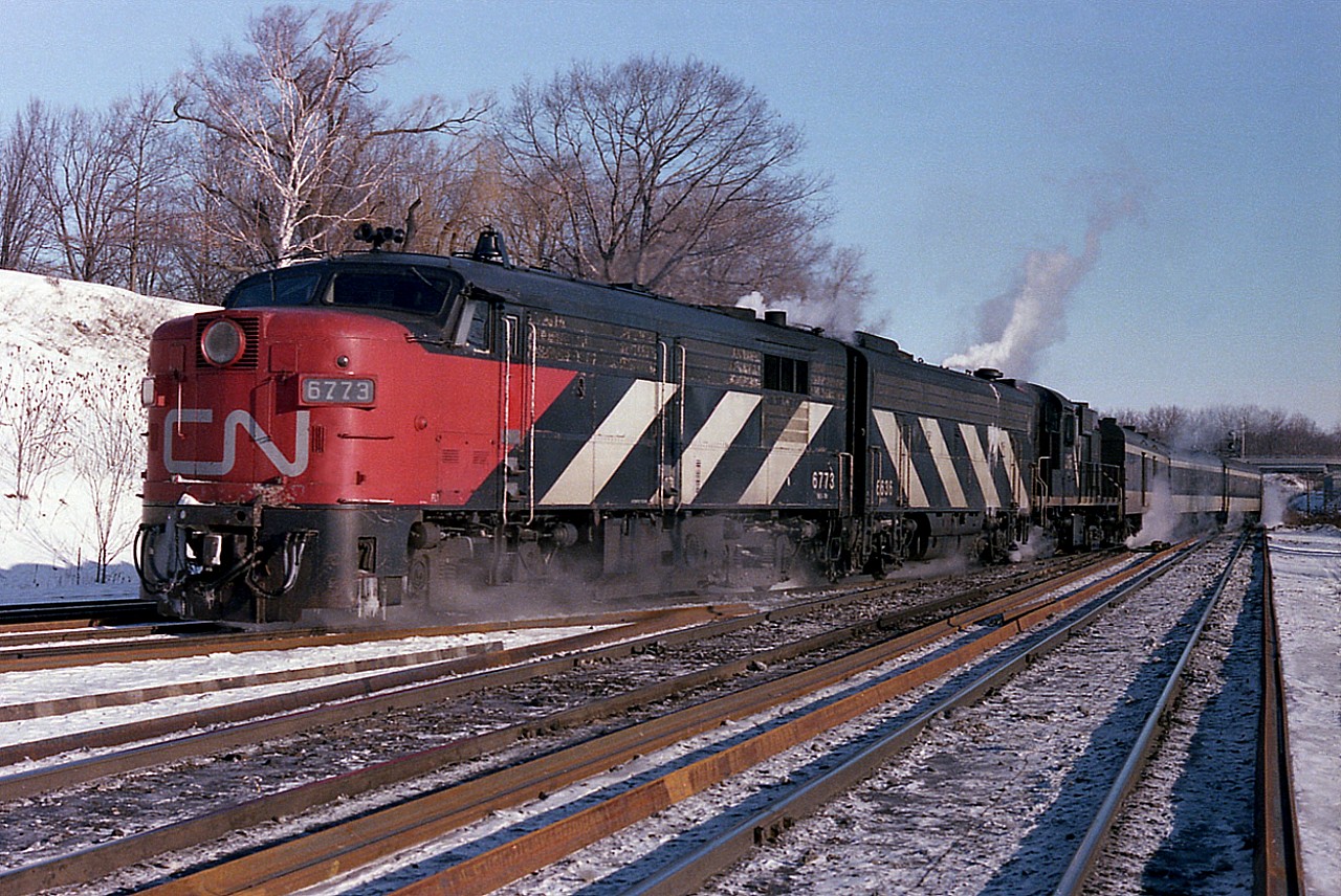 Beautiful crisp morning, obviously, as CN 6773, 6636 and 3116 run westbound as VIA train #81, which on schedule would be around 0935 thru here. Lots of ribbon rail on the ground. Maintenance thru Bayview, now that I look back at it, seemed to be continuous.