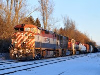BCOL 4607, CN 5765, and BCOL 4643 lead CN M38531 06 through Copetown with 130 cars