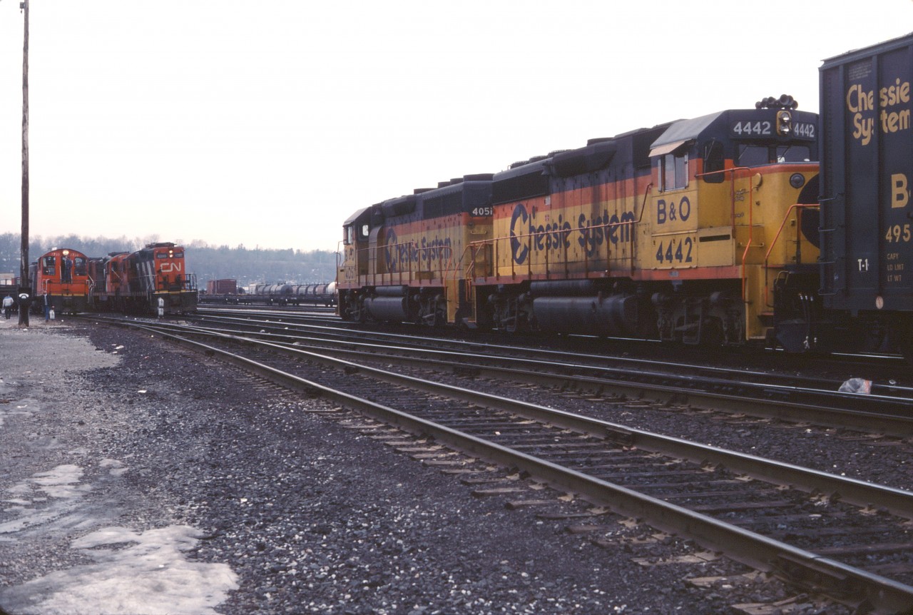 This photo has intrigued me since I acquired it a few years ago. It appears to show a Chessie System westbound train detouring over CN through Hamilton with a pair of GP40-2s (4051 and 4442). In the background, CN 7733 and 4380 "check out" the visitor.

Perhaps one of our Railpictures.ca members can shed some light on this movement and whether there were others like it.