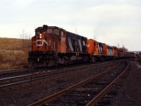 CN certainly ran some interesting consists in the mid-1980s. Here we see a westbound cresting the Dundas hill at Copetown with an interesting M420W/RS18/F7A/GP9 lash-up (3523, 3742, 9165 and 4590).