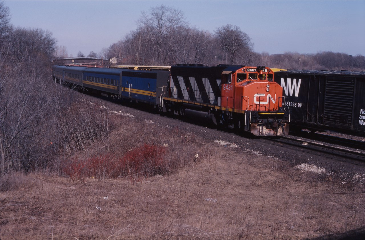 After a disastrous holiday season in 1983-84, the Canadian Transport Commission held a public hearing into VIA's on-time performance. As a result, VIA leased 20 CN GP40-2LW units and two GP40s for the 1985-1986 winter, pending delivery of F40PH-2 units in 1986 and 1987. Here we see CN 9431 leading a westbound VIA (likely No. 75 to Windsor) in  March 1986.