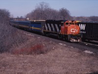 After a disastrous holiday season in 1983-84, the Canadian Transport Commission held a public hearing into VIA's on-time performance. As a result, VIA leased 20 CN GP40-2LW units and two GP40s for the 1985-1986 winter, pending delivery of F40PH-2 units in 1986 and 1987. Here we see CN 9431 leading a westbound VIA (likely No. 75 to Windsor) in  March 1986.