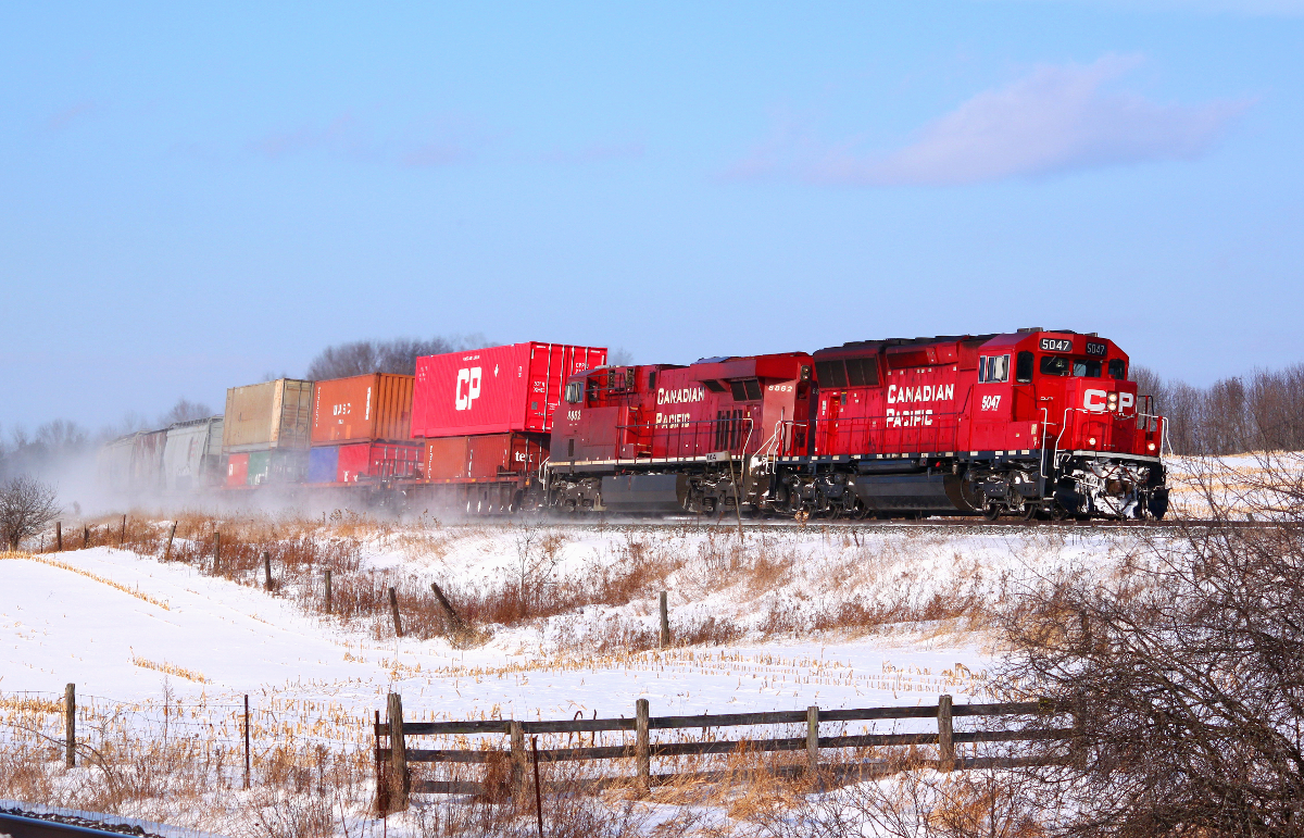 CP 142 rolls through Port Hope with an SD30C-ECO in the lead.