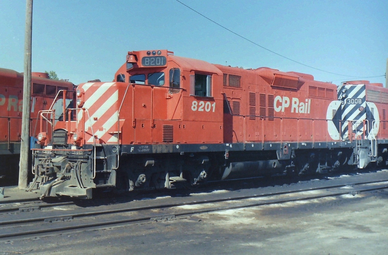 Nice warm day in Cranbrook! Not sure why I was there, but I think I had contractors working on the post office roof at the time. Anyways after work was over for the day I drifted down to the CP yards & CP 8201 was idling away so I grabbed a shot of it.  Mainly I took photographs of individual locomotives,rolling stock,or buildings because I knew that things were always changing, & I might not get to see them again.