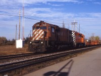 Canadian Pacific had trackage rights over Canadian National's Oakville subdivision for over 100 years, ending around 2008. In this scene, we have CP's daily Toronto-Hamilton turn ("the Starlight") making its usual late afternoon move through Burlington on its way to the now former TH&B Aberdeen Yard in Hamilton.