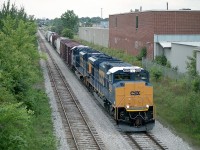   London built CSXT SD70ACes 4838 and 4840 lead GEXR's #432 eastward out of Kitchener toward Toronto on a high overcast August morning. Units ran for a brief time over the line in order to get the 'bugs' out.There were about 20 of them built by GMD back then if I recall correctly. They certainly received a lot of railfan attention at the time.