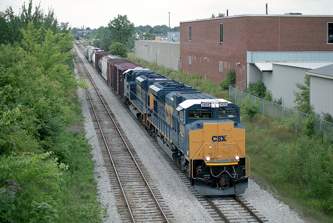 London built CSXT SD70ACes 4838 and 4840 lead GEXR's #432 eastward out of Kitchener toward Toronto on a high overcast August morning. Units ran for a brief time over the line in order to get the 'bugs' out.There were about 20 of them built by GMD back then if I recall correctly. They certainly received a lot of railfan attention at the time.