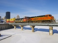 Very unusually for Eastern Canada, a BNSF unit is leading a train, with BNSF 7421 and CN 2423 the power on a late CN 149 leaving the Port of Montreal. This BNSF unit led CN X388 (emtpy windmill flats) from Chicago to Joffre yard near Quebec City and then went back west on a CN 309 which terminated in Taschereau Yard in Montreal this morning. The power then went light to the port to bring a short (336 axles) CN 149 out on a cold but sunny day.