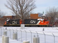 The Pointe St-Charles Switcher with CN 7228 and clean class leader CN 4700 are about to leave their namesake yard to pick up empties at the nearby O-I plant.
