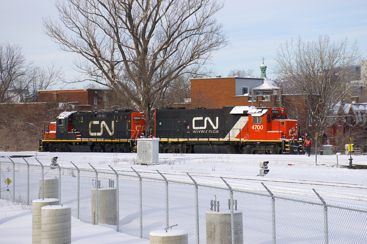 The Pointe St-Charles Switcher with CN 7228 and clean class leader CN 4700 are about to leave their namesake yard to pick up empties at the nearby O-I plant.