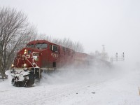 CP 8795 kicks up the snow as it leads CP 650 through Lasalle. CP 8541 is at the rear of this loaded ethanol train which is bound for Albany, NY.