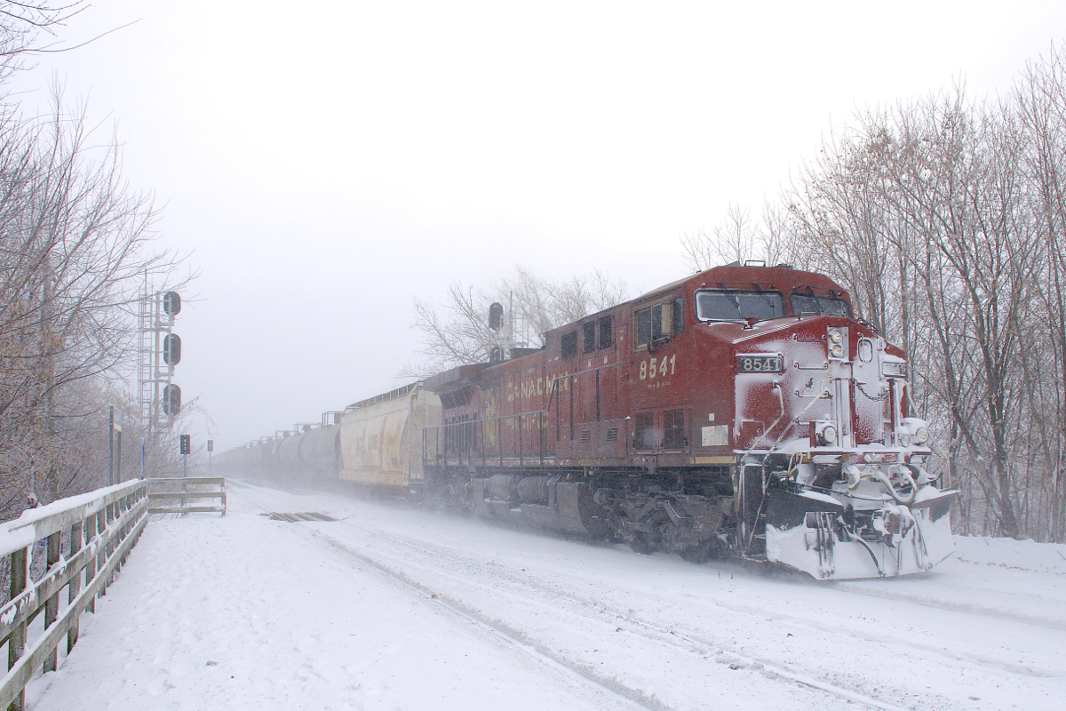 CP 8541 is at the rear of loaded ethanol train CP 650 which is bound for Albany, NY as it passes Lasalle Station.