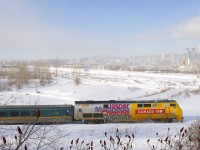 A late VIA 633 with VIA 903 leading is preparing to head onto the Victoria Bridge before backing up to Central Station in Montreal. 