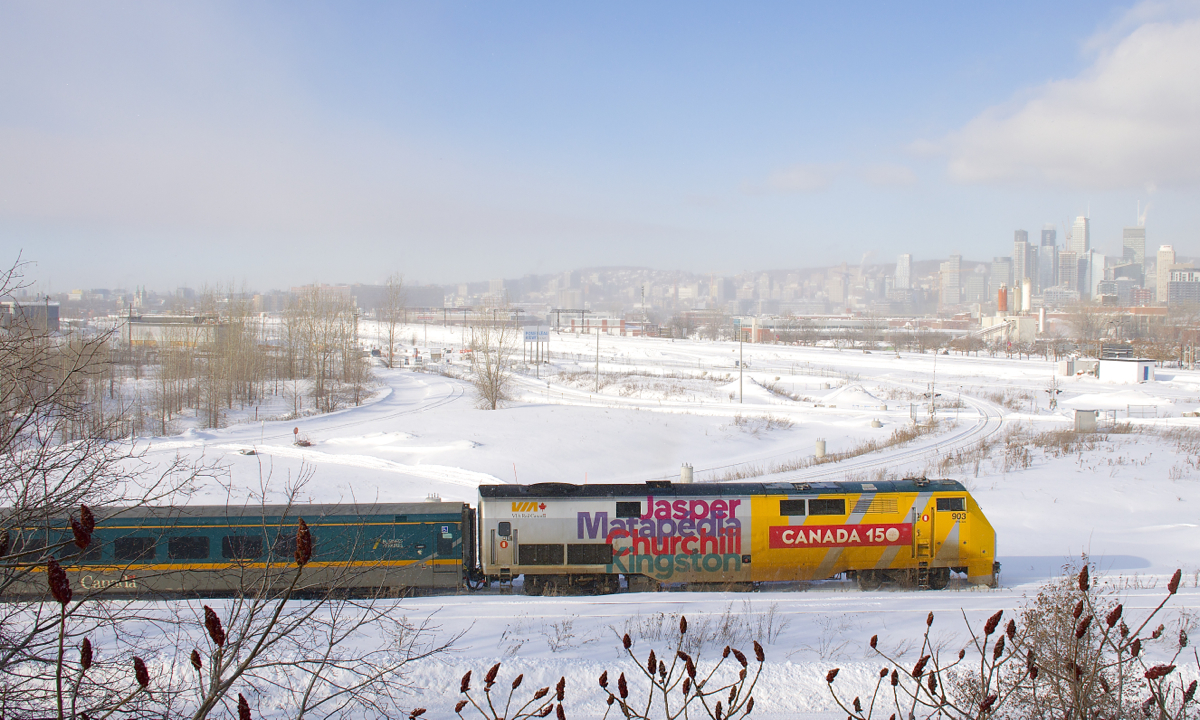 A late VIA 633 with VIA 903 leading is preparing to head onto the Victoria Bridge before backing up to Central Station in Montreal.