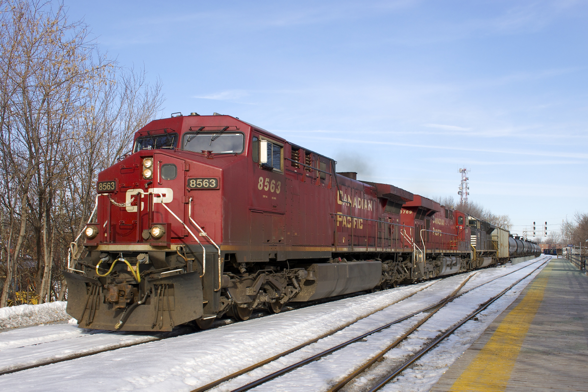 With one more unit than it usually has, loaded ethanol train CP 650 passes through Lasalle Station with CP 8563, CP 8769 & NS 2758 for power.