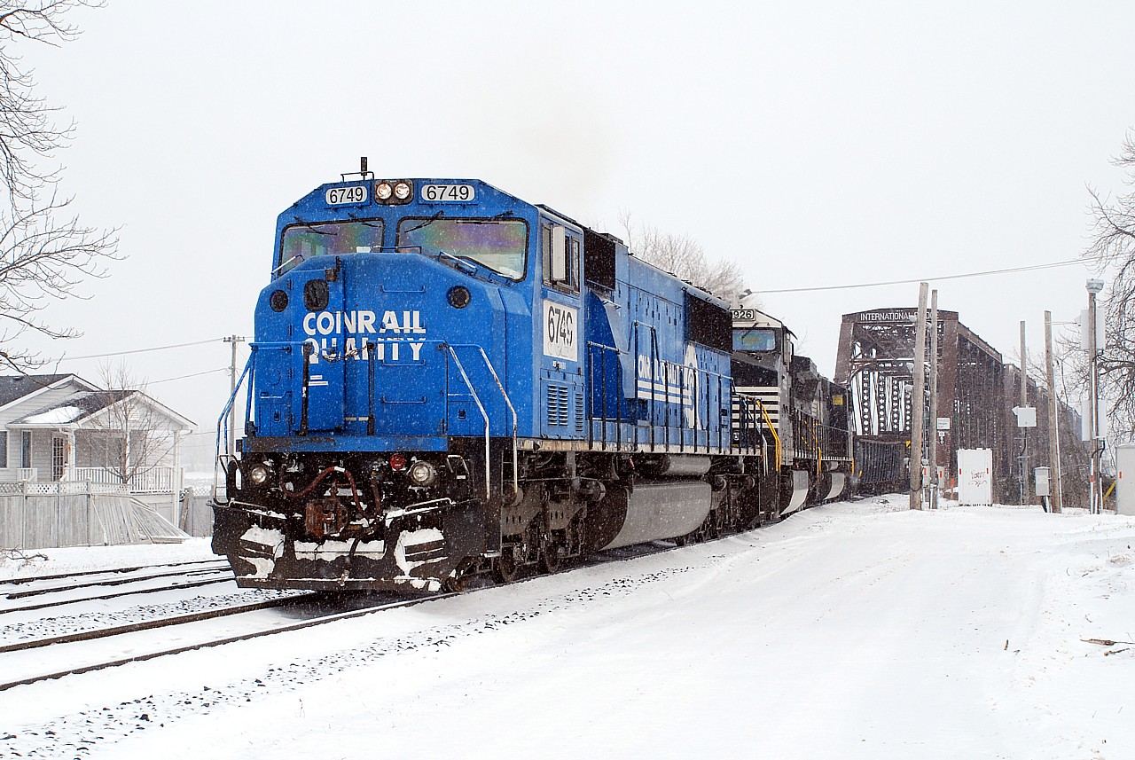10 years ago today it was a lot snowier as NS 369 slowly pulled across the International Bridge to enter Canada and interchange cars with CN.  The practice continues today, often mid-afternoon, however the train symbol is currently NS C93.  It's a good way to get a dose of American railroading without actually having to cross the border, and given the short run from NS's Bison Yard you never now what power will show up on the train.  Unfortunately it won't be Conrail blue.