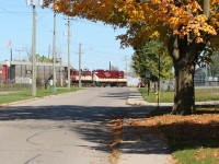 Ontario Southland Railway GP7 378 and RS23 503 are seen switching interchange traffic with Canadian Pacific at Woodstock on a pleasant fall morning. 