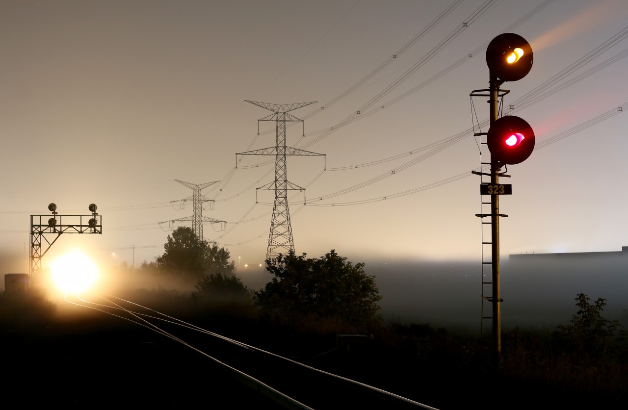 During the early morning hours of September 20, fog patches briefly rolled through Milton as a meet between a CN eastbound and westbound at Mansewood was being orchestrated. The fog was luckily thick enough to mute the headlight brightness of the eastbound prior to it being completely turned off for the meet. While the low hanging fog creates a bit of an erie setting.