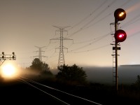 During the early morning hours of September 20, fog patches briefly rolled through Milton as a meet between a CN eastbound and westbound at Mansewood was being orchestrated. The fog was luckily thick enough to mute the headlight brightness of the eastbound prior to it being completely turned off for the meet. While the low hanging fog creates a bit of an erie setting.