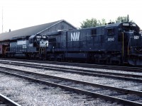 Here we see a set of Norfolk Southern units (a C30-7, still in N&W paint, and an SD40-2), next to the former freight shed which housed staff for the Wabash/N&W/NS-CN "Joint Section" into the 1990s. Trains operating over the Cayuga and Chatham subs would drop their traffic at Talbotville, about 4 miles to the west, and then tie up here with their caboose.